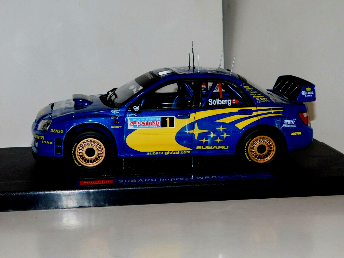 ミニカー Sun Star Rally Collectibles Subaru 1:18 s-l1200.jpg