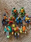 Vintage lot of 9 Teenage Mutant Ninja Turtle figures w/ Weapons Accessories