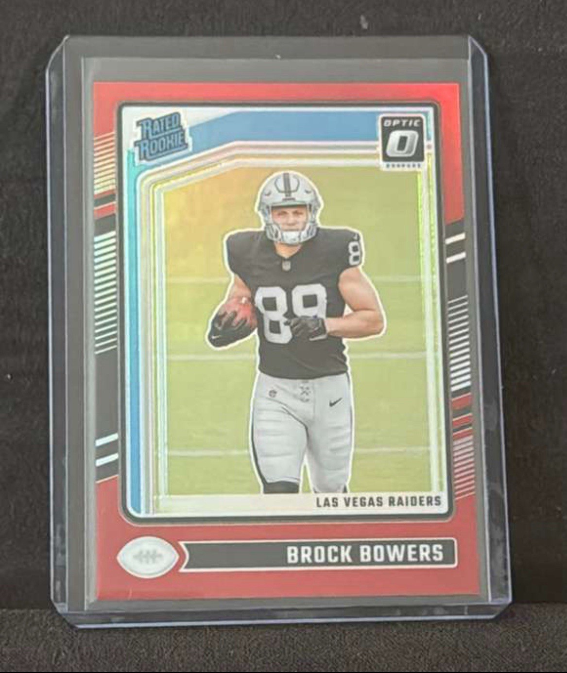 2024 Panini Donruss Optic - Rated Rookie Brock Bowers #215 Red Prizm /125 (RC)