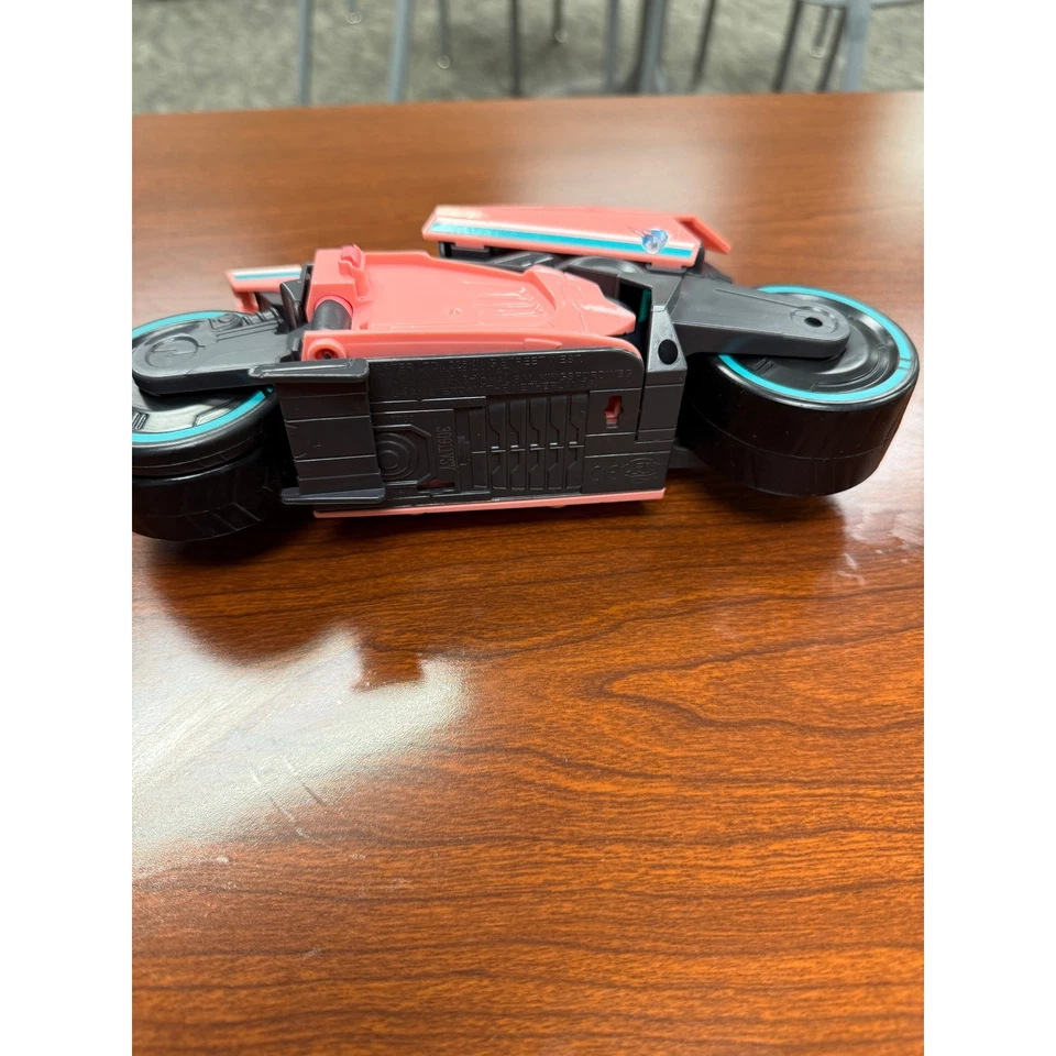 Vehículo de juguete futurista rosa verde azulado número 22 Foto 3 de 4