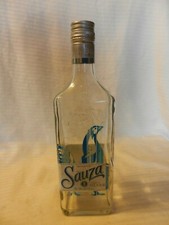 Botella vacía Sauza Tequila plateada importada con tapa en relieve con gallo azul