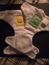 REALITYWORKS INFANT GREEN & YELLOW Computer Chip DIAPER SET New Unsealed Model 3