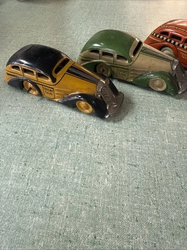 1930s LOUIS MARX Yellow Green  TRICKY TAXI Mechanical Wind-Up Lot Of 2