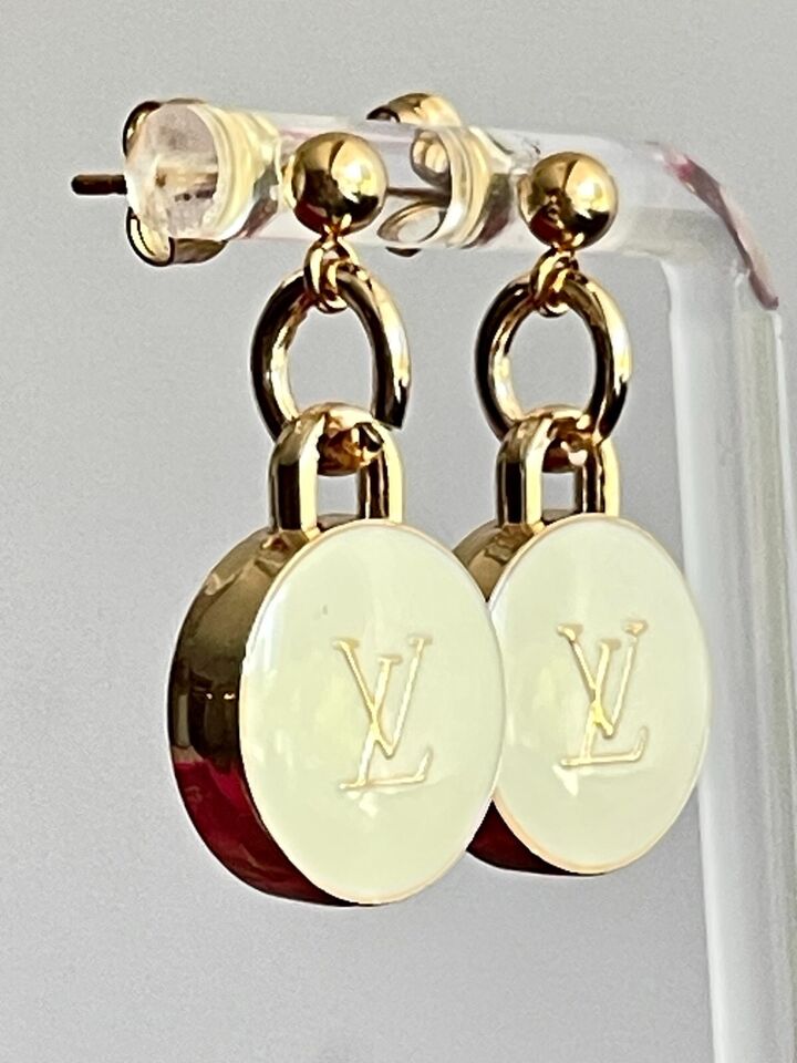 Authentic charms Earrings Louis Vuitton repursoted beige stud piercing ...