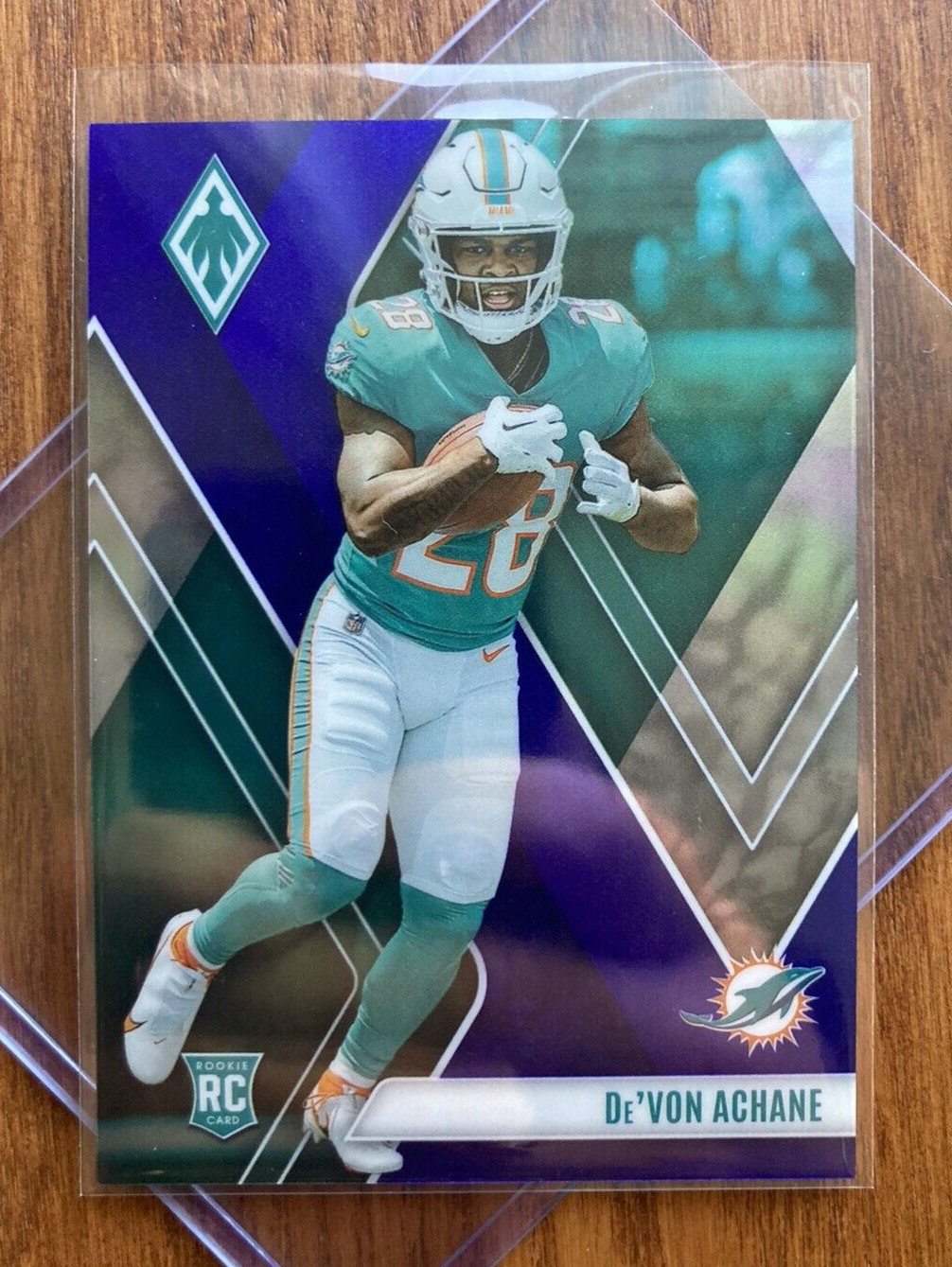 De'VON ACHANE - RoOkiE /35 - 2023 Phoenix #130 - BLUE 22/35 - MIA Dolphins x