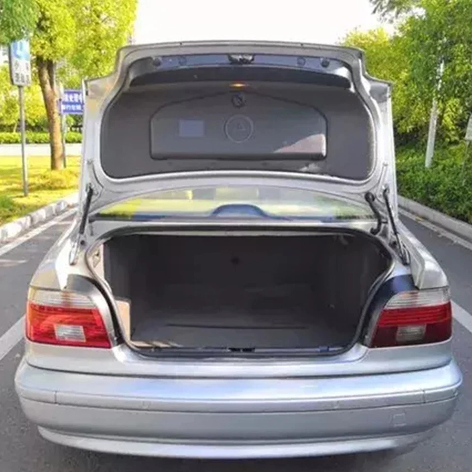 Soportes de elevación de maletero trasero de coche amortiguador puntales de gas para BMW 525i 530i 528i 1997-2003 Foto 2 de 4