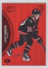 2021-22 Skybox Metal Universe Rookies PMG Red 24/100 Lassi Thomson #194 14hk