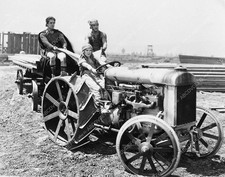 6035-004 Ramon Novarro Francis X Bushman May McAvoy driving a tractor on set sil
