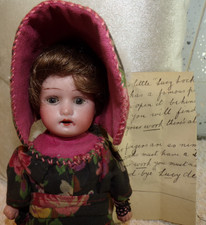 ANTIQUE DOLL AS A HANGING BAG WITH A HANDWRITTEN NOTE LUCY LOCKET POCKET