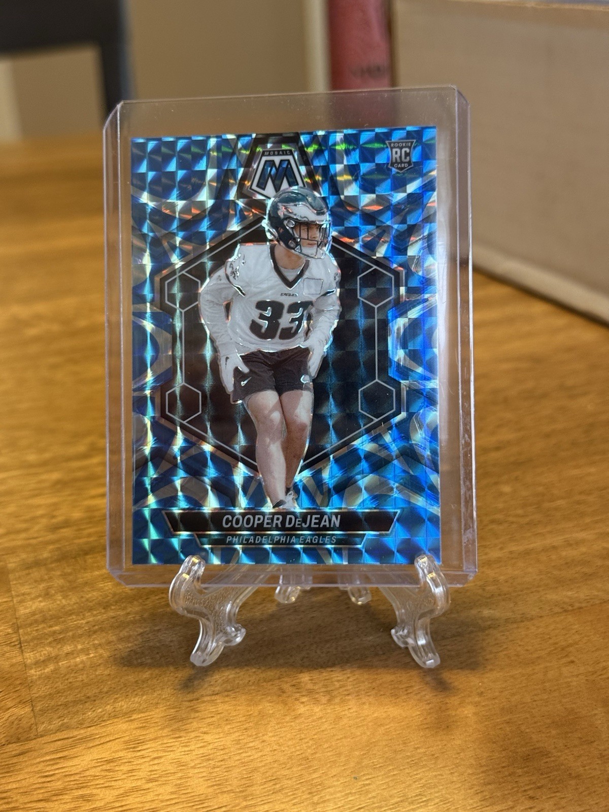 2024 Panini Mosaic - Rookies Cooper DeJean #340 Reactive Blue Mosaic Prizm (RC)