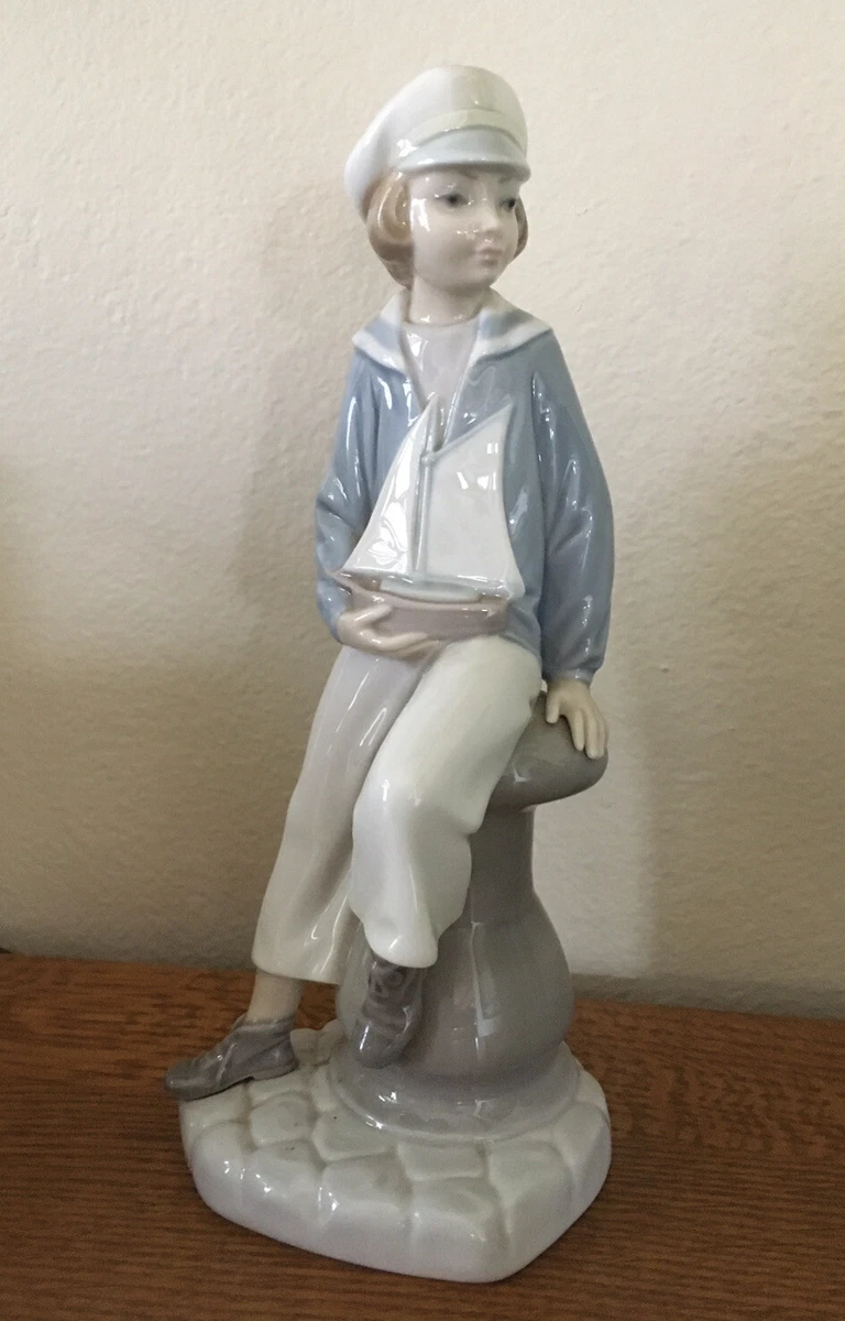 Lladro online boy figurines