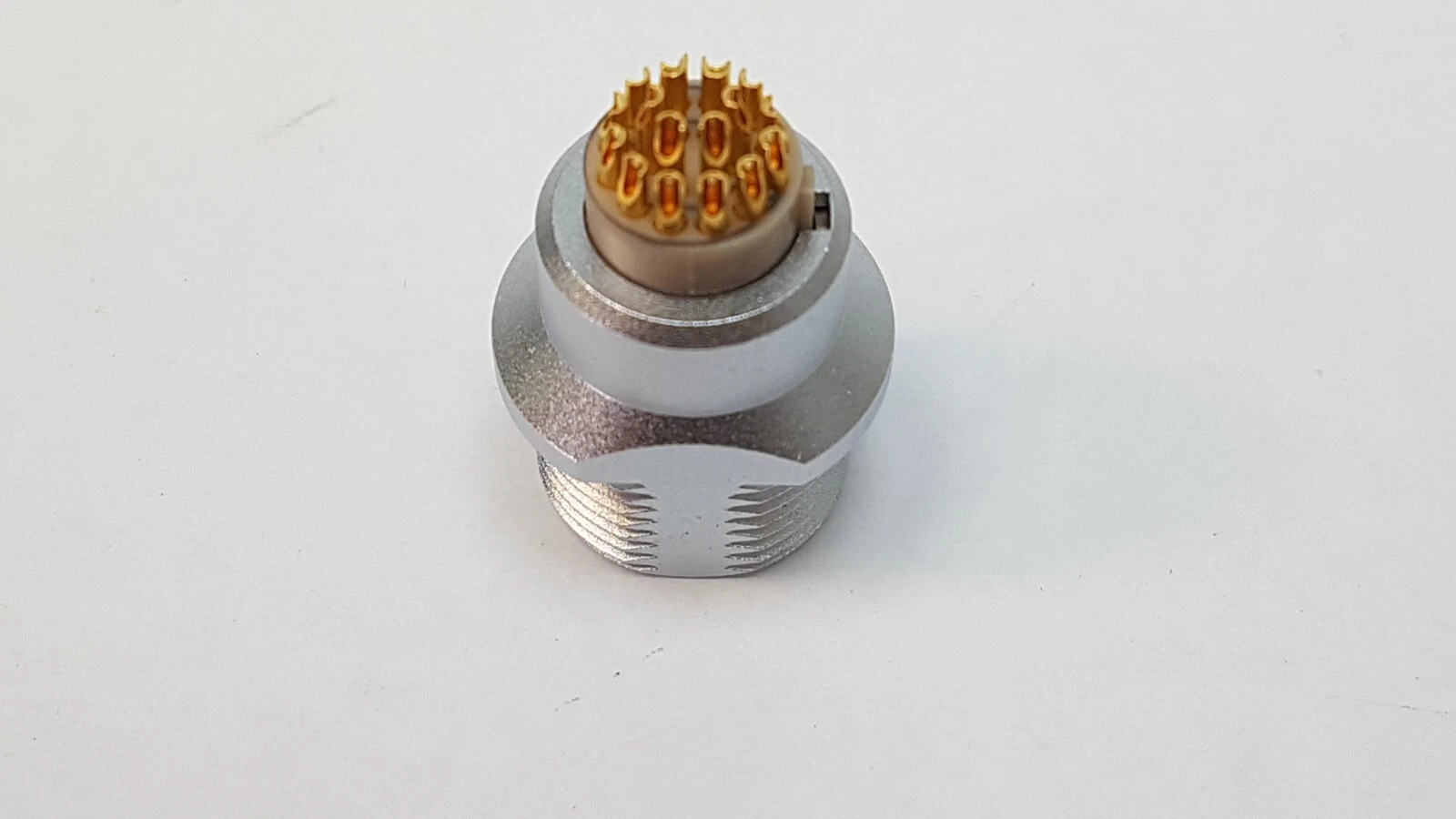 Rear of an ODU MINI-SNAP receptacle with gold-plated cup terminals