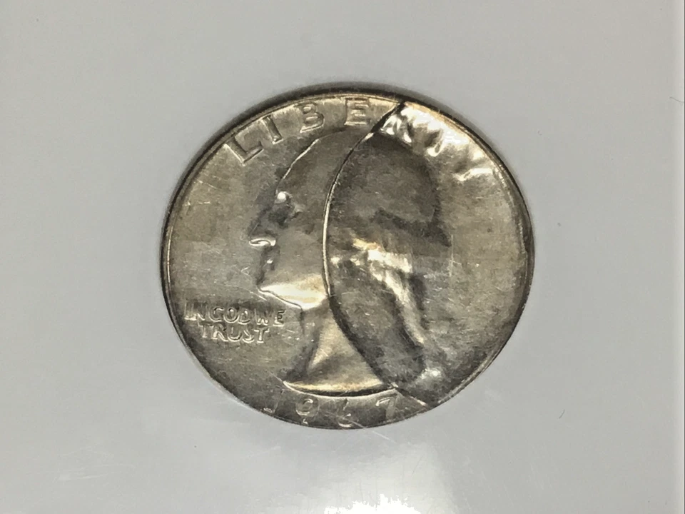 1967 .25c MINT ERROR INDENTED OFF CENTER by FRAGMENT CLAD LAYER From Another 25c - Image 2 of 4