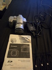 Panasonic Lumix DMC-FZ7  Digital Camera 6MP Tested Working with charger & manual