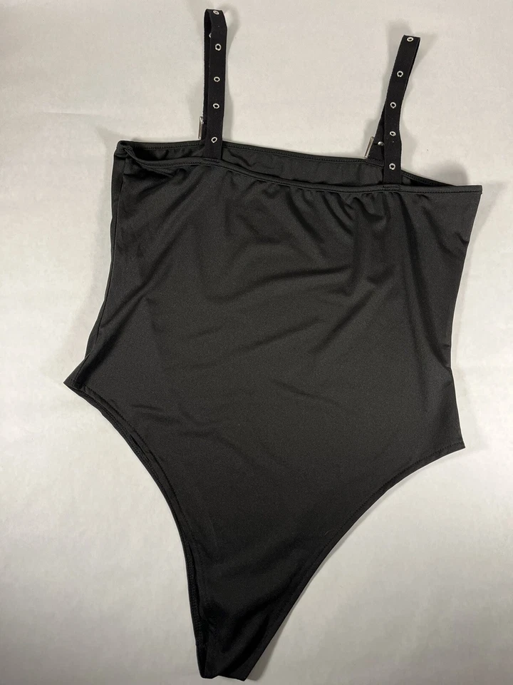 Camiseta sin mangas/camisola negra única de una pieza talla mediana Foto 3 de 4