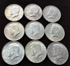 LOT OF 9, 1964 KENNEDY HALF DOLLARS 90% SILVER FEW W TONING