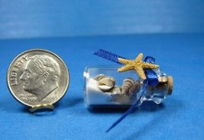 MINI BEACH IN A BOTTLE 1" glass bottle with tiny natural shells, sand, starfish