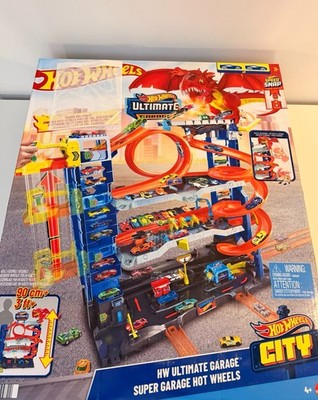 Hot Wheels City Ultimate Garage Track Set with 2Die-Cast Toy Cars, Stores 50+veh