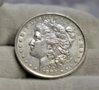 1883 O  US Morgan Silver Dollar $1 AU (Cleaned)