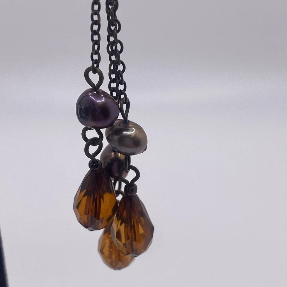 Pendientes colgantes estilo boho color ámbar estrás perlas de agua dulce tono bronce Foto 4 de 4