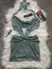 NWT's Women's Fashion Nova Tight fitting halter top dress, teal color Size XS