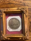 US morgan silver dollar . 1921 morgan in pretty gold frame