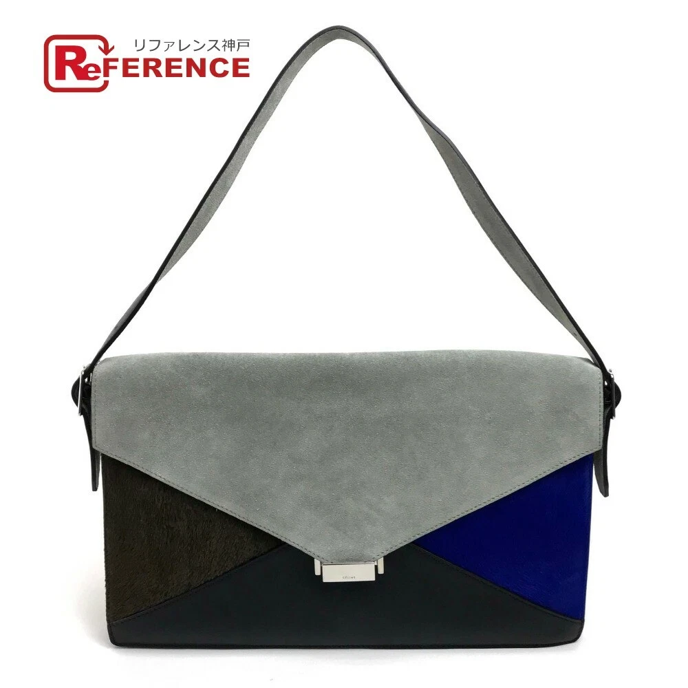 Celine store triangle clutch