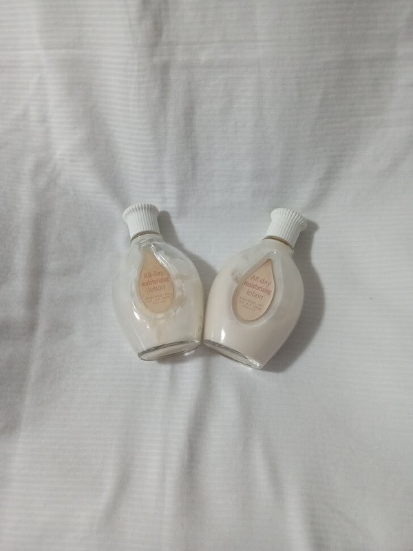 2 Vintage Avon Dew Kiss All Day Moisturizing Lotion Bottles