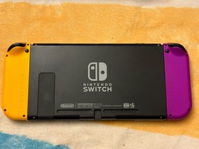 Nintendo Switch Bundle,Orange & Purple Console, Case,Power Cord, Dock & Micro SD