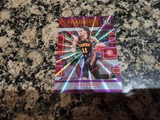 2022-23 Panini Donruss Franchise Features Trae Young #11 Holo Purple Laser 14/99