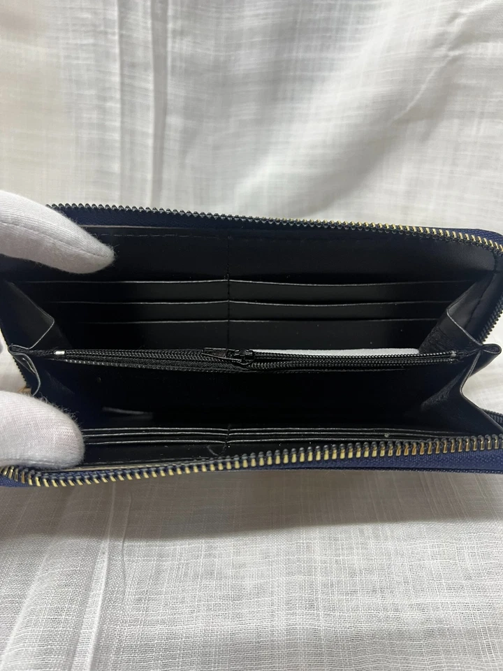 Cartera de diseño de alfombra con patrones culturales y ricos detalles marrones - Hecha a mano Foto 4 de 4