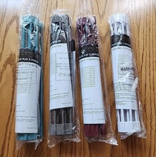 Curtis Stone roll up drying rack /Trivet blue, red, white, and gray.