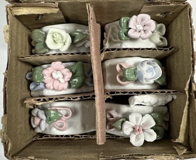 Vtg Set of 6 Porcelain Napkin Rings Raised Flowers Ribbon Hexagon Shape In Box