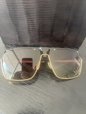 Sunglasses by Sama Eyewear Model ALBERTO in Black and Gold Color Combination