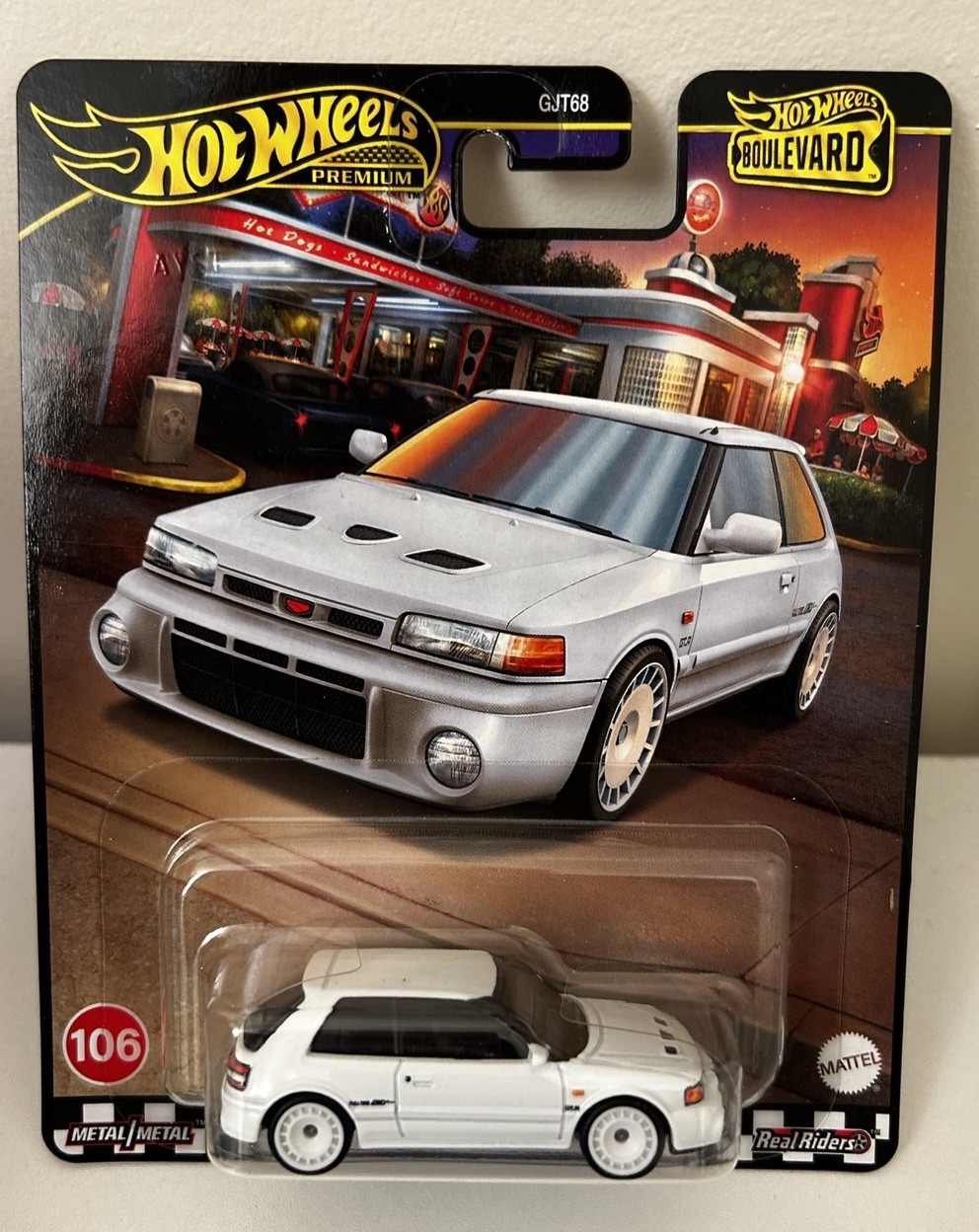 Hot Wheels Premium Boulevard MAZDA 323 GTR #106