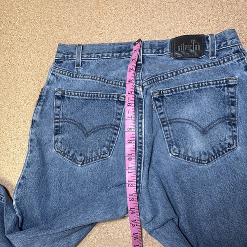 Jeans cónicos holgados sueltos con lengüeta plateada vintage Levi’s talla 33x32 años 90 EE. UU. - Imagen 7 de 9