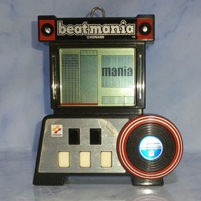 Beatmania 2 Konami (unknown) ▷ Retro Handheld Games