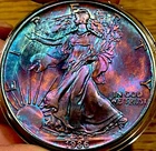 Beautiful 1986 American Silver Eagle Rainbow Toned  .999 Silver U.S. Coin