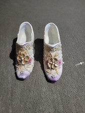 two decorative porcelain shoe figurines made in germany