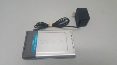 D-Link DSS-8+  8-port 10/100Mbps Switch with adapter.