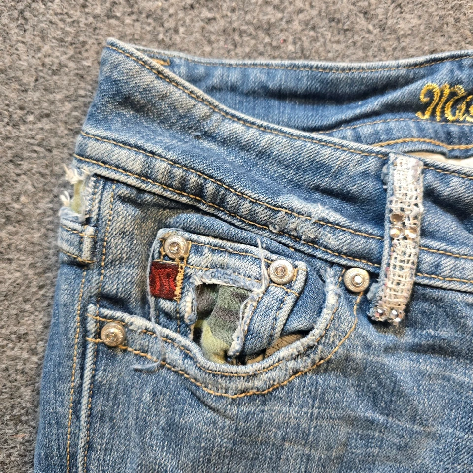 Pantalones de mezclilla Miss Me para mujer talla 25 azul camuflaje detalles corte bota estrás rodeo occidental Foto 3 de 4