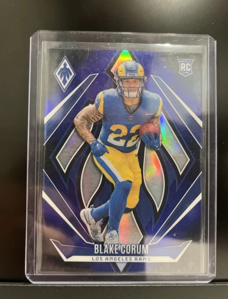 2024 Panini Phoenix - Rookies Blake Corum #158 Blue Fade /249 (RC)