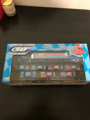 PETTY RACING 50th ANNIVERSARY SET TRANSPORTER PLUS 7 CARS mint NIB