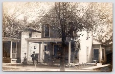 RPPC Carrie's Home w/Doric Columns~Side Stoop w/Chair, Planter, Bicycle RPPC
