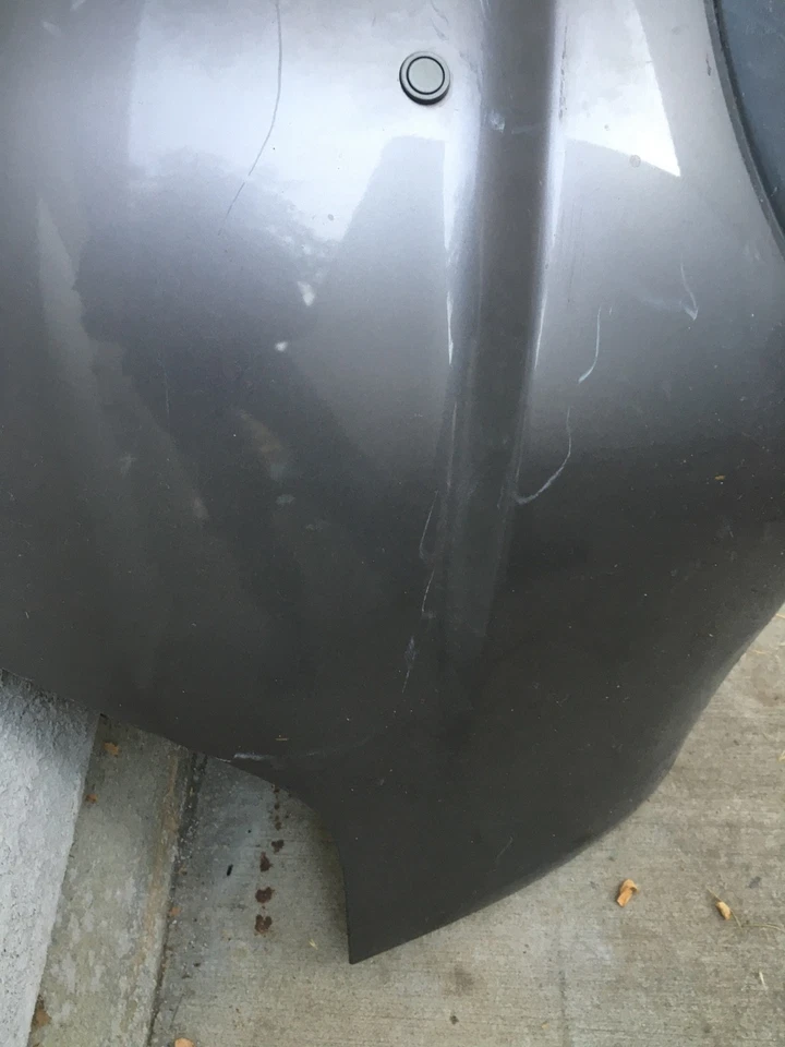 Parachoques trasero gris Jaguar XF 2008-2011 OEM Foto 3 de 4