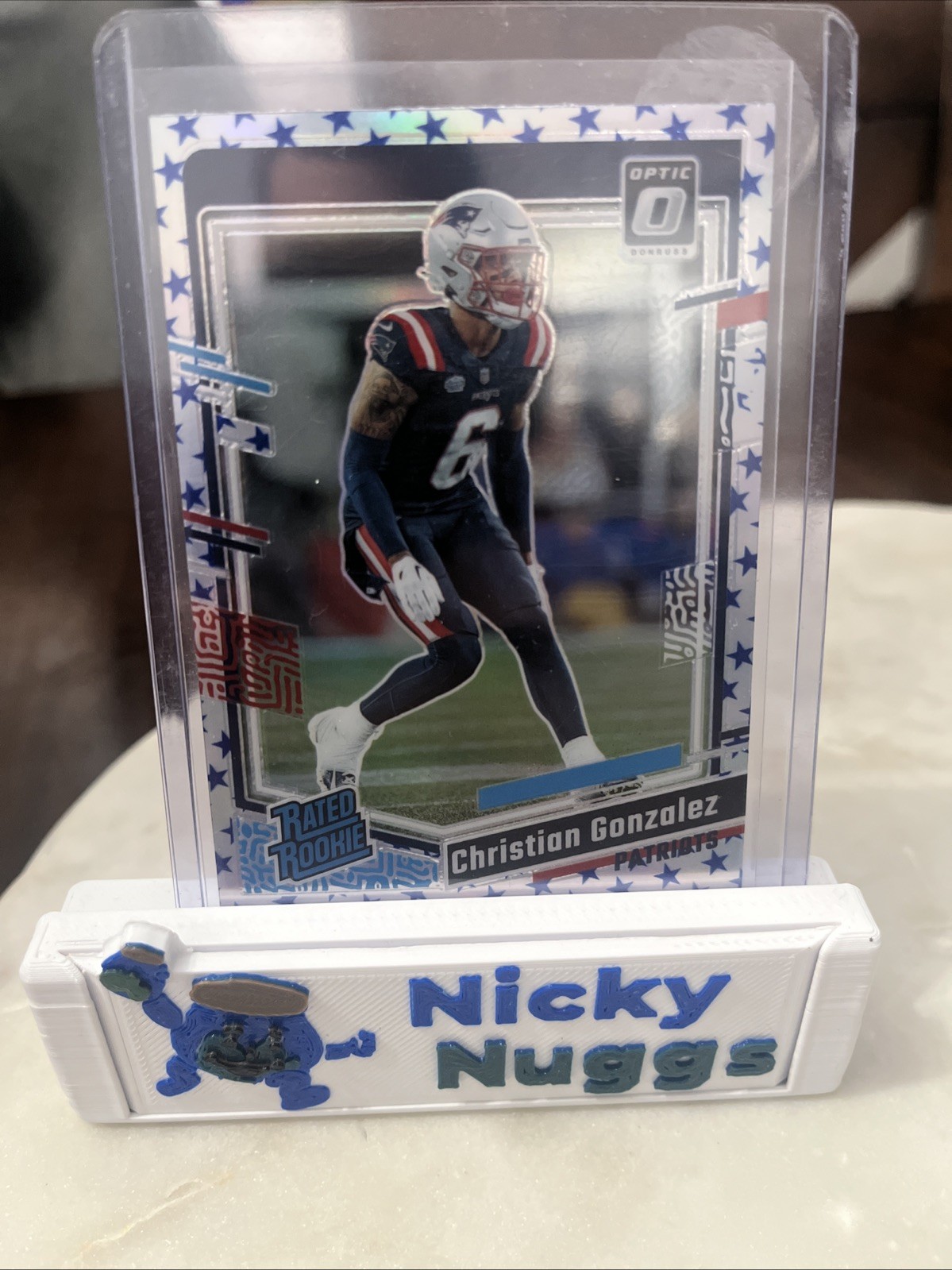 2023 Optic Christian Gonzalez Blue Stars Prizm Rated Rookie #274 Patriots
