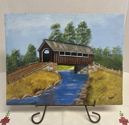 Original signed folk art  painting of a covered wooden bridge over a stream unframed , wall art