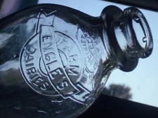 1 qt.  Shively's Dairies / Engle's Dairies Dual Stamped cross over Milk Bottle