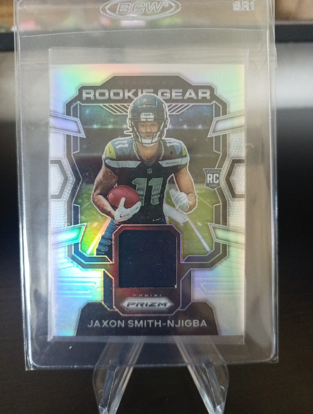 Jaxon Smith Njigba #RG-JS Football Cards 2023 Panini Prizm Rookie Gear trading card — raw and PSA graded price guide
