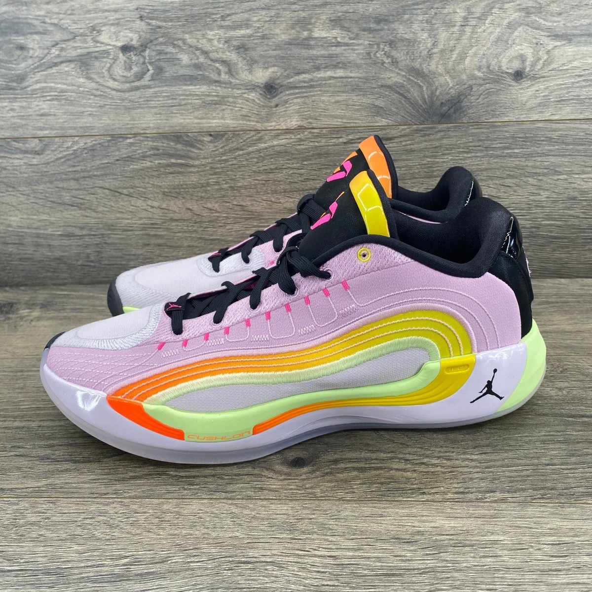 pink and yellow basketball shoes
